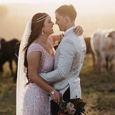 A couple enjoying sunset on a farm